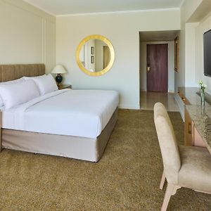 Gasten Kamer met een King Size Bed op de Hoek